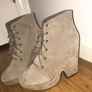 Tan high heeled booties